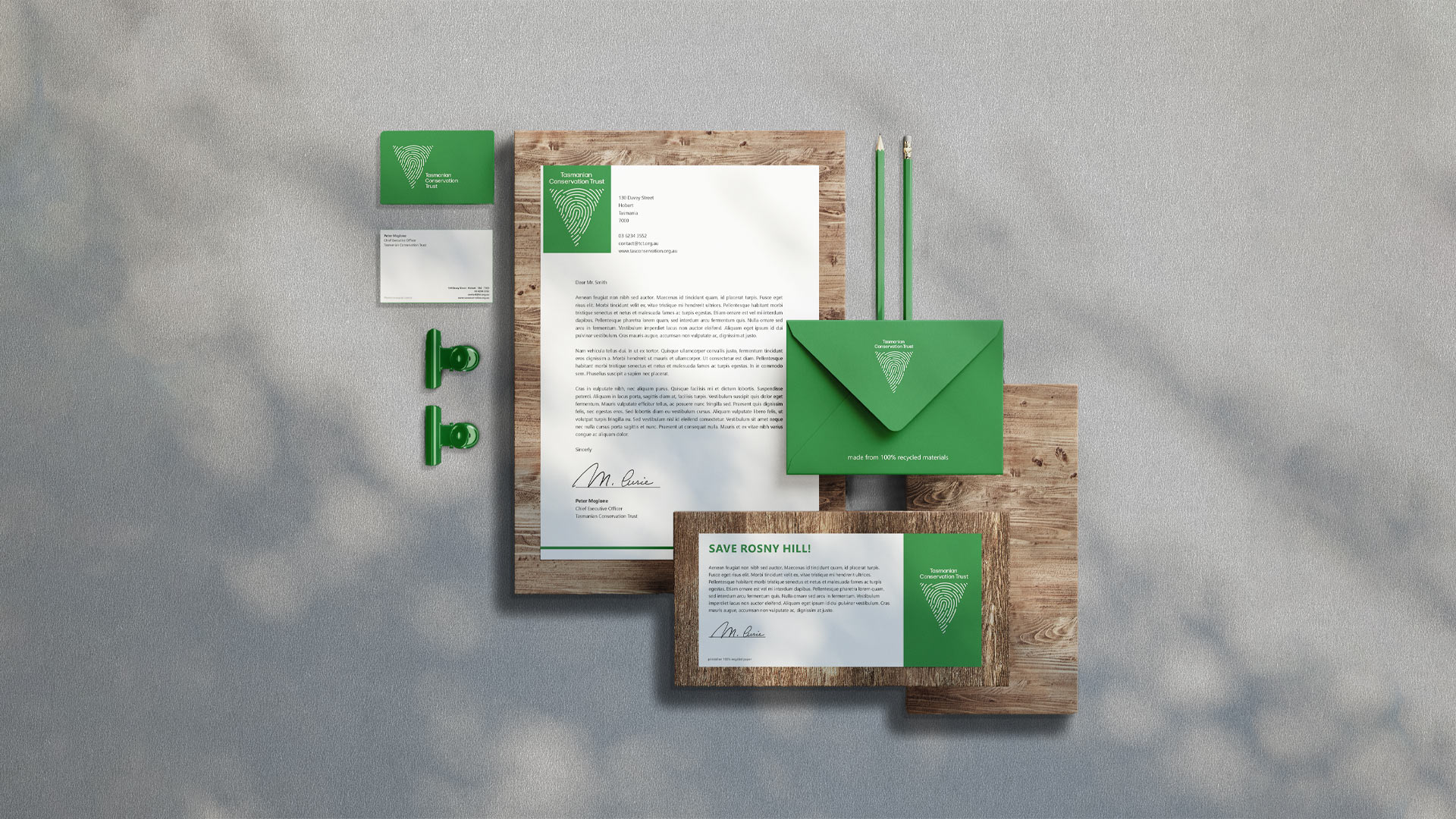 Tasmanian Conservation Trust logo on various forms of stationary