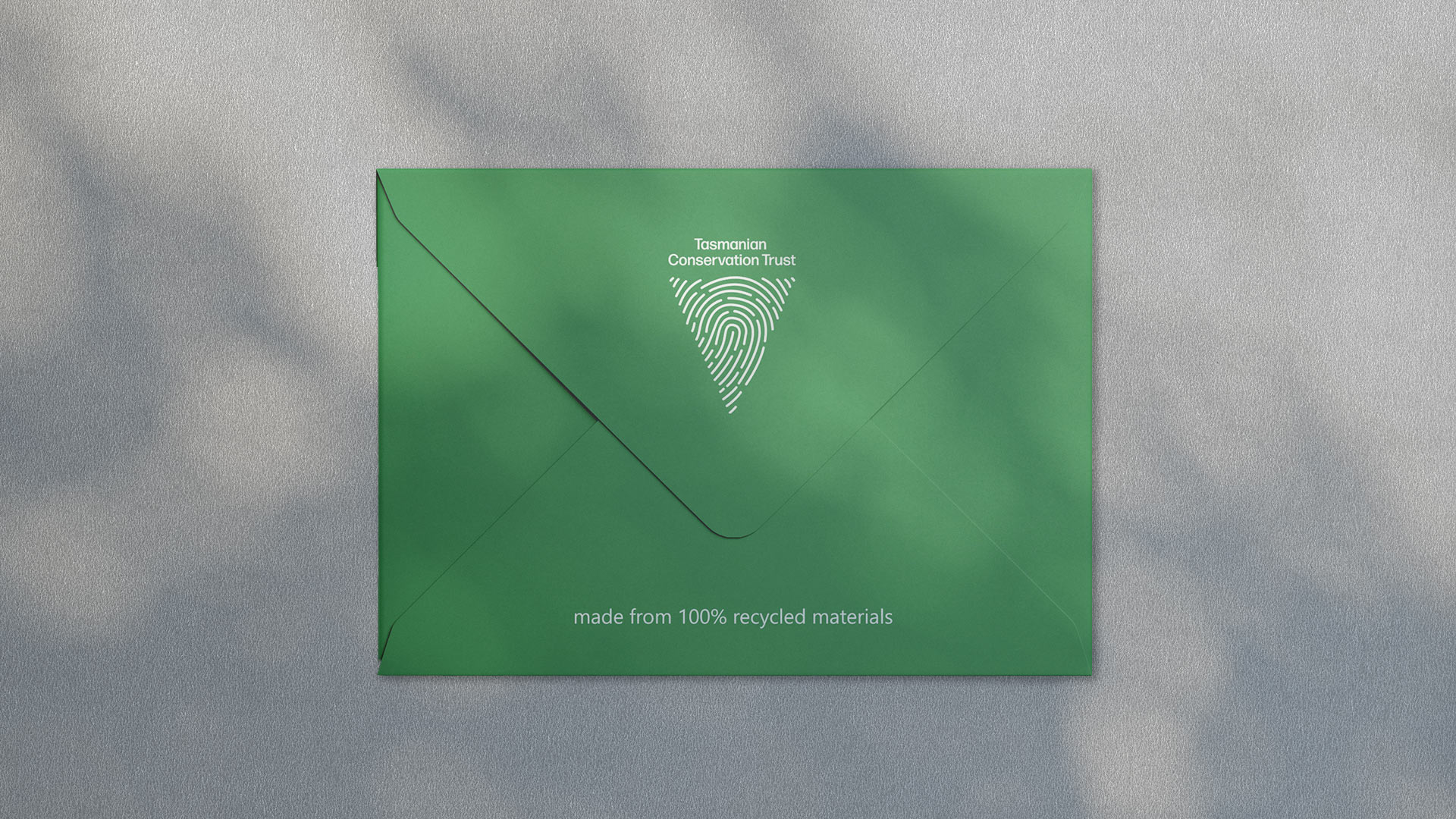 Tasmanian Conservation Trust logo on a green envelope